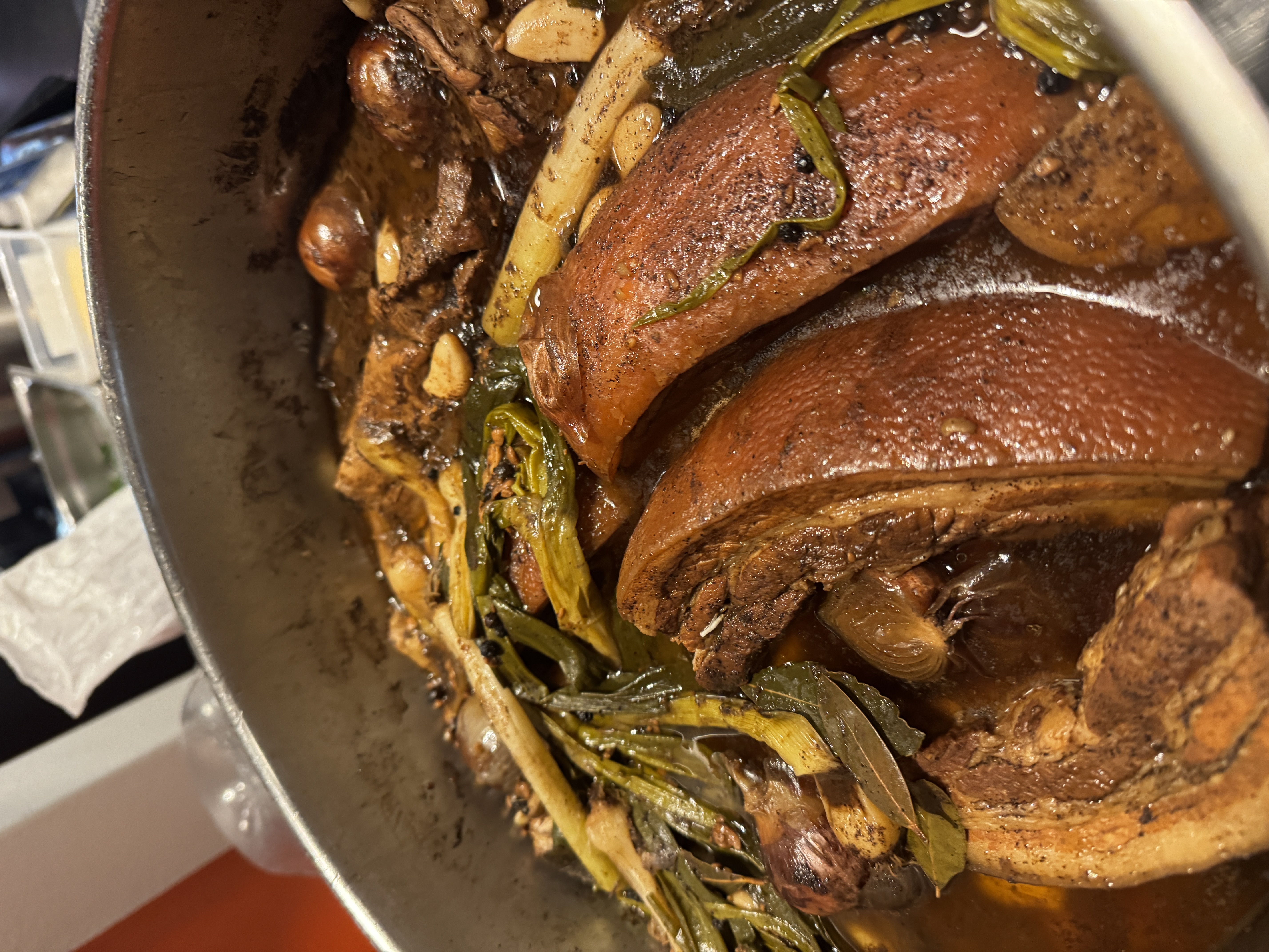 Slow-braised Korean meat prepared in a high-volume service pan